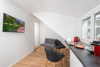 Télévision ou salle de divertissement dans l'établissement Hyper Centre 16 rue Valdemaine