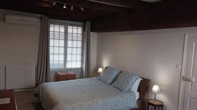 Un ou plusieurs lits dans un hébergement de l'établissement Le Logis de Stofflet