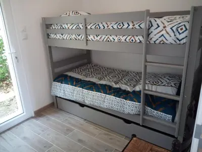Un ou plusieurs lits dans un hébergement de l'établissement R & C - Room & Calm