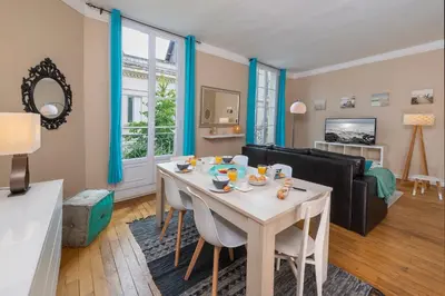 Cuisine ou kitchenette dans l'établissement Appartement Coeur de Ville rue Saint-Laud