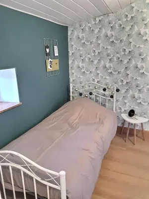 Un ou plusieurs lits dans un hébergement de l'établissement Gites de la Bonaudrie