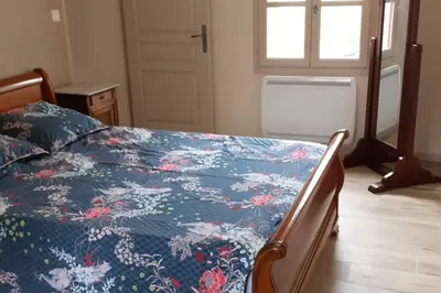 Un ou plusieurs lits dans un hébergement de l'établissement Gite de la petite folie
