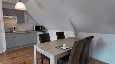 Cuisine ou kitchenette dans l'établissement Les gîtes du petit Marcel