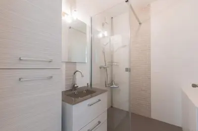 Salle de bains dans l'établissement LE PANORAMIQUE - Face mer - Wifi