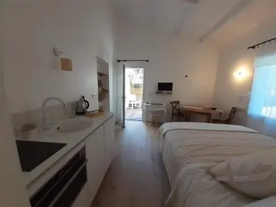 Un ou plusieurs lits dans un hébergement de l'établissement Chambre Cosy Chic
