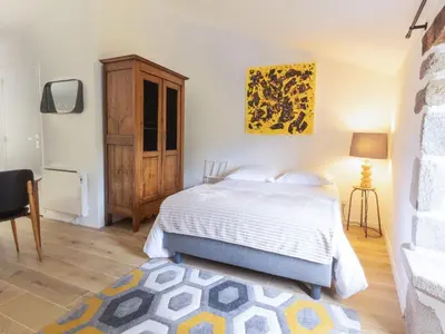 Un ou plusieurs lits dans un hébergement de l'établissement Studio cosy rénové avec terrasse privative, pour 2 personnes, proche de la Sèvre - FR-1-426-483