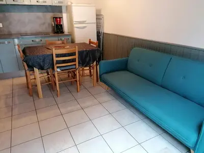 Coin salon dans l'établissement Maison dans les dunes