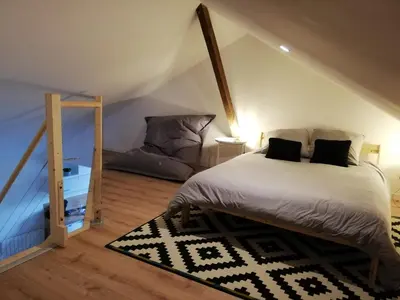 Un ou plusieurs lits dans un hébergement de l'établissement T2 Duplex Segré - Hyper centre - Wifi - Netflix