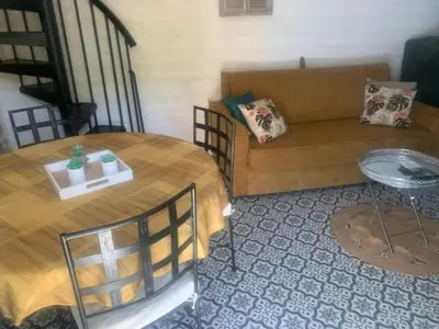 Coin salon dans l'établissement GÎTE BARBE BLEUE