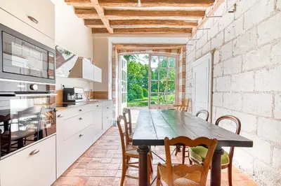 Cuisine ou kitchenette dans l'établissement Château le Fresne