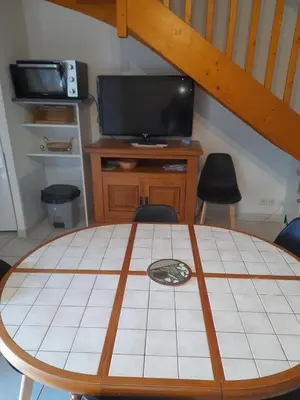 Télévision ou salle de divertissement dans l'établissement Maison 4-6 personnes