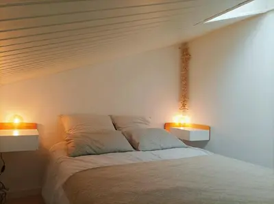 Un ou plusieurs lits dans un hébergement de l'établissement Maison Bord de mer à Noirmoutier