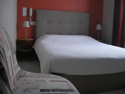 Un ou plusieurs lits dans un hébergement de l'établissement Auberge du Calvaire