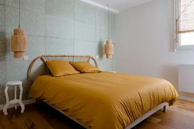 Un ou plusieurs lits dans un hébergement de l'établissement Magnifique appartement 50m2 aux portes de Nantes