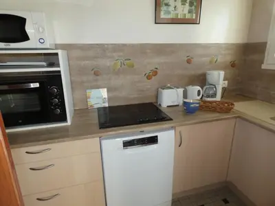 Cuisine ou kitchenette dans l'établissement Appartement vue mer à Notre-Dame-de-Monts - 5 personnes, animaux - FR-1-540-147