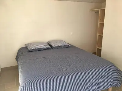 Un ou plusieurs lits dans un hébergement de l'établissement Maison au Vieil à NOIRMOUTIER