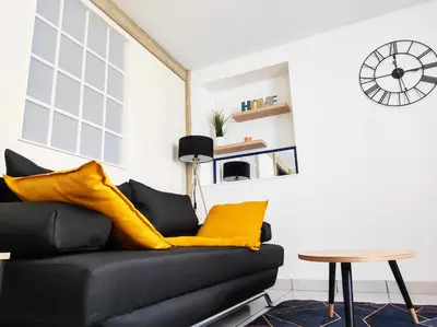 Cuisine ou kitchenette dans l'établissement Le 4midable - Chaleureux 2 pièces