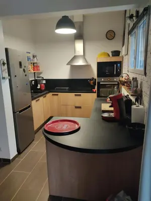 Cuisine ou kitchenette dans l'établissement chez fifi