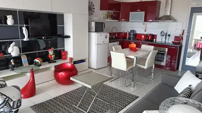 Cuisine ou kitchenette dans l'établissement Les sables d’or