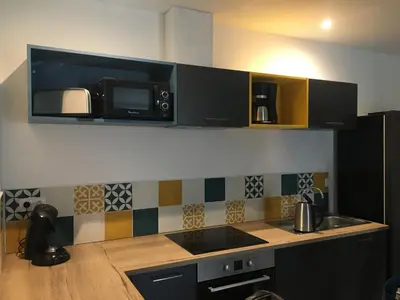 Cuisine ou kitchenette dans l'établissement Au boitissandeau