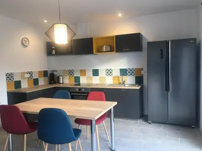 Cuisine ou kitchenette dans l'établissement Au boitissandeau