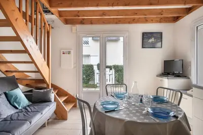 Coin salon dans l'établissement Vacances familiales dans cette maison à Pornichet