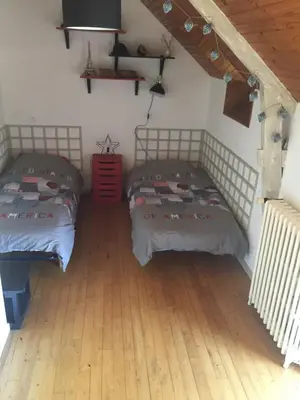Un ou plusieurs lits dans un hébergement de l'établissement Gîte à la campagne
