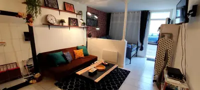Télévision ou salle de divertissement dans l'établissement Studio, TopdestinationBretagne