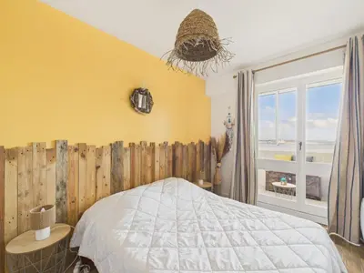 Un ou plusieurs lits dans un hébergement de l'établissement Profiter de ce bel appartement à Saint Hilaire de Riez!
