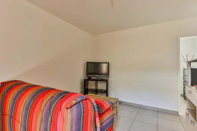 Télévision ou salle de divertissement dans l'établissement Le Remblai - 50m de la plage - Terrasse