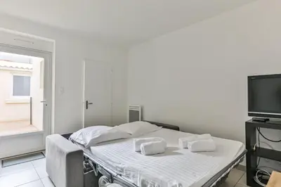 Télévision ou salle de divertissement dans l'établissement Le Remblai - 50m de la plage - Terrasse