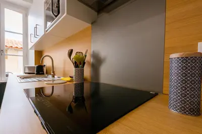 Cuisine ou kitchenette dans l'établissement Le Logis à Mimine