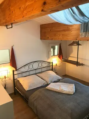 Un ou plusieurs lits dans un hébergement de l'établissement Les Agapanthes