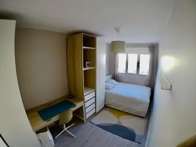 Un ou plusieurs lits dans un hébergement de l'établissement Charming & cosy rooms Nantes (chambres chez l'habitant)
