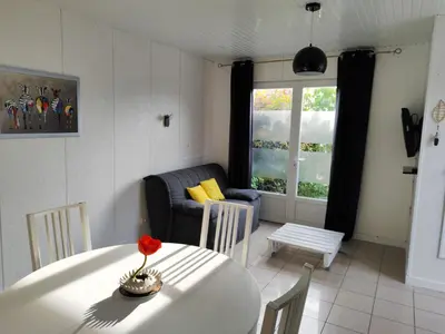 Coin salon dans l'établissement Chalet 38 m2, au calme reposant, près du puy /fou