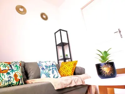 Coin salon dans l'établissement Le 3plex - Coeur de Vertou - Original