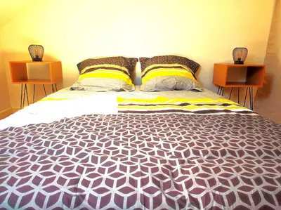 Un ou plusieurs lits dans un hébergement de l'établissement Le 3plex - Coeur de Vertou - Original