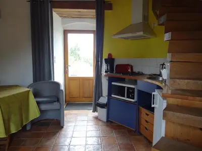 Cuisine ou kitchenette dans l'établissement La Tour du Moulin Géant