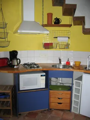 Cuisine ou kitchenette dans l'établissement La Tour du Moulin Géant