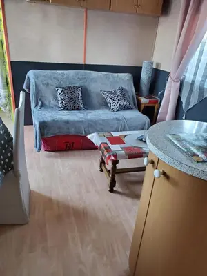 Un ou plusieurs lits dans un hébergement de l'établissement Mobil home chez l habitants