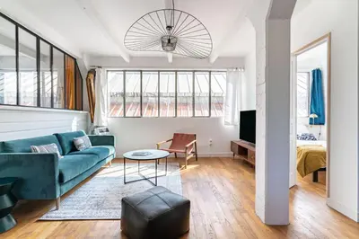 Coin salon dans l'établissement NOCNOC - Loft L'Atelier T5 de 130m2 Proche Centre