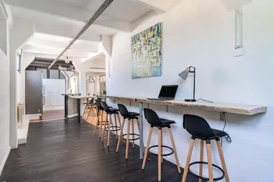 Télévision ou salle de divertissement dans l'établissement NOCNOC - Loft L'Atelier T5 de 130m2 Proche Centre