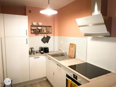 Cuisine ou kitchenette dans l'établissement Au85, Bel appartement, vue océan, pied de la plage