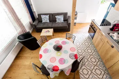 Coin salon dans l'établissement MOANA - Petit cocon situé quartier République