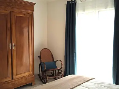 Un ou plusieurs lits dans un hébergement de l'établissement Maison Cosy, Rénovée, Proche Plage et Centre, Jardin, Animaux Bienvenus - FR-1-652-19
