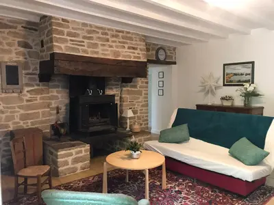 Coin salon dans l'établissement Logement de charme calme assuré