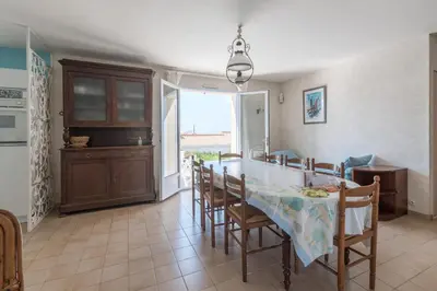 Cuisine ou kitchenette dans l'établissement L'Horizon - Vue mer - Parking - Jardin