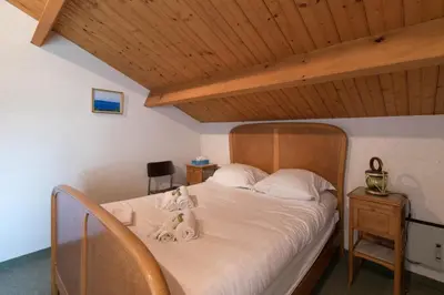 Un ou plusieurs lits dans un hébergement de l'établissement L'Horizon - Vue mer - Parking - Jardin