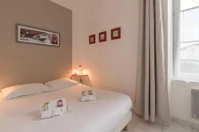 Un ou plusieurs lits dans un hébergement de l'établissement La Birochère - 400 m plage - Parking