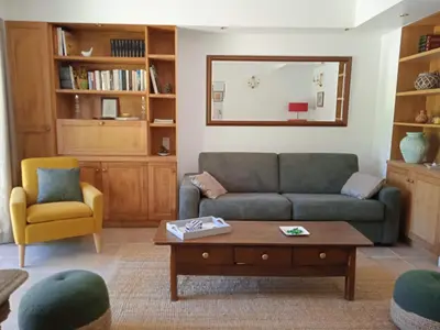 Coin salon dans l'établissement Cottage sur le Domaine du golf de la Bretesche